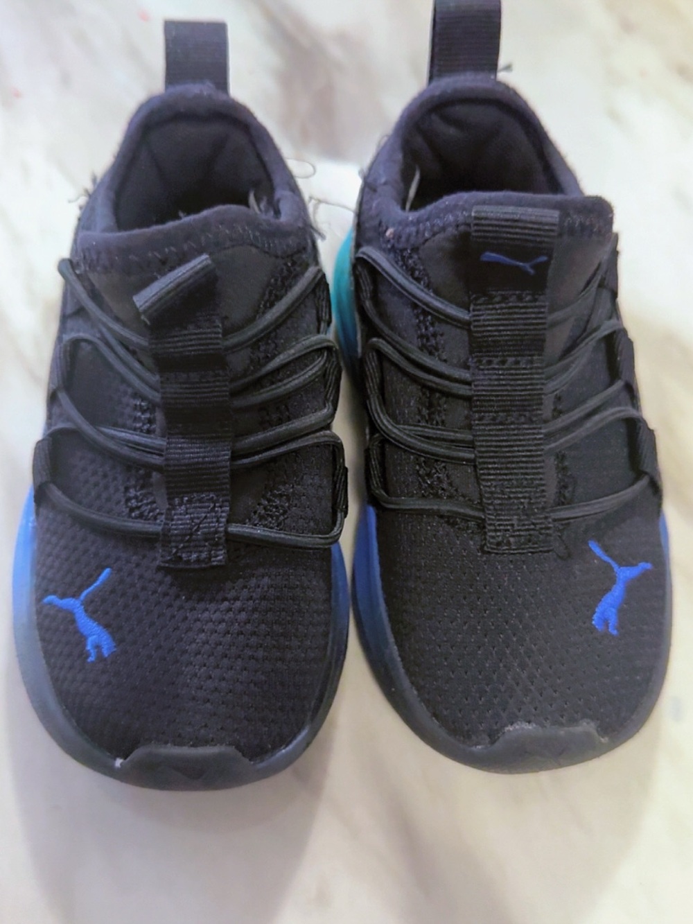 Puma Kids Black Sneakers with Blue Accents